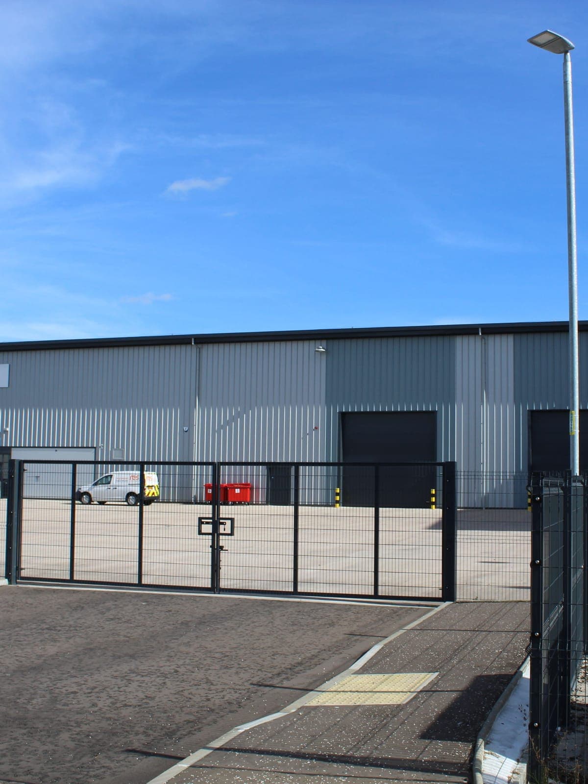 The yard gates and loading doors along the front of the units