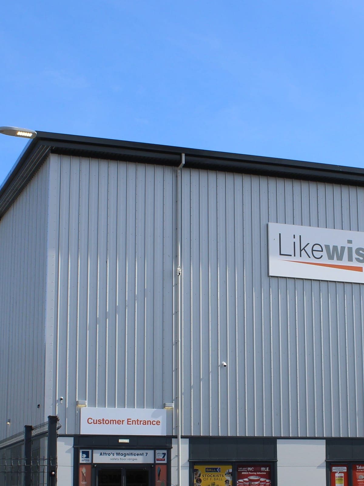 The corner of one of the Belgrave Street units in silver profiled cladding