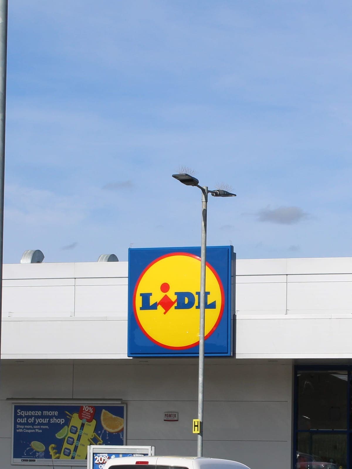 The Lidl sign above the white-clad store front at Bellshill